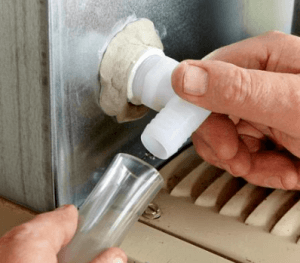 Clearing a clogged condensate drain